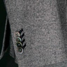 Grey Cashmere Birdseye Blazer with contrasting Navy Blue Herringbone Lapel and Pocket Insert. Contrasting Navy Blue buttonholes on a working sleeve